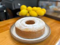 a bundt cake sitting on a plate on a table at NewVida Preserve in Wilmington