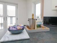 TV a/nebo společenská místnost v ubytování Ocean Retreat