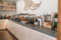 Η κουζίνα ή μικρή κουζίνα στο Blue Harbour Boutique