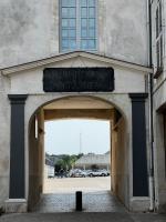 an entrance to a building with a sign over it at La Petite Rochambelle (hyper centre-ville) in Vendôme