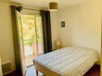 Posteľ alebo postele v izbe v ubytovaní Appartement F3, 4 Couchages, Balcon, Wi-Fi, Garage, Ascenseur, Proche Centre et Cures, Amélie-les-Bains - FR-1-703-97