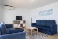 Posedenie v ubytovaní Apartamentos Torre Yago