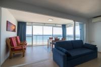 Posedenie v ubytovaní Apartamentos Torre Yago