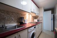 Kuchyňa alebo kuchynka v ubytovaní Apartamentos Torre Yago