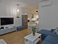 Kuchyňa alebo kuchynka v ubytovaní Berki Apartman