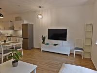 Kuchyňa alebo kuchynka v ubytovaní Berki Apartman