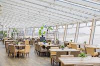 Restaurant ou autre lieu de restauration dans l'établissement De Pier Suites