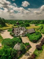 an aerial view of a house with a garden at Pensjonat Uroczysko Zaborek in Janów Podlaski
