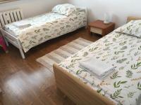 Posteľ alebo postele v izbe v ubytovaní Apartament Centrum
