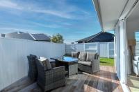 Papamoa Coastal Luxuryにあるパティオまたは屋外エリア
