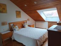 Postel nebo postele na pokoji v ubytování Apartamento Os Pineiros Cambados