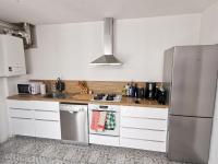 A kitchen or kitchenette at Les Bleuets - Les Sables d Olonne