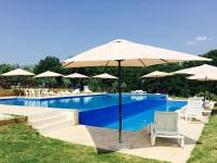 Bazén v ubytovaní Agriturismo Nociquerceto alebo v jeho blízkosti