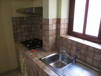 A kitchen or kitchenette at Diving Center Punta Stilo