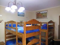 A bed or beds in a room at Diving Center Punta Stilo
