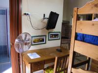 A bed or beds in a room at Diving Center Punta Stilo