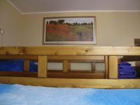 A bed or beds in a room at Diving Center Punta Stilo