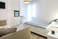 Posteľ alebo postele v izbe v ubytovaní Accanto Alle Mura Rooms & Relax Spa