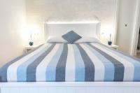Posteľ alebo postele v izbe v ubytovaní Accanto Alle Mura Rooms & Relax Spa