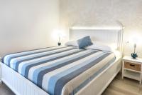 Posteľ alebo postele v izbe v ubytovaní Accanto Alle Mura Rooms & Relax Spa
