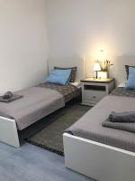 Posteľ alebo postele v izbe v ubytovaní Sunset Rental