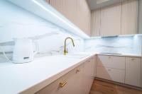 Kuchyňa alebo kuchynka v ubytovaní Lake Park Apartament
