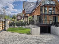 Vonkajšia záhrada v ubytovaní VisitZakopane - Lizbona Apartment