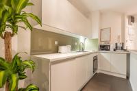 Kuchyň nebo kuchyňský kout v ubytování Nest Apartment