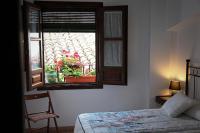 Posteľ alebo postele v izbe v ubytovaní Casa Rural Azahar