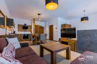 Kuchyňa alebo kuchynka v ubytovaní TATRA SUITES Vila HIMALAYA