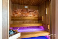 Posteľ alebo postele v izbe v ubytovaní TATRA SUITES Vila HIMALAYA