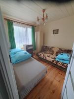 Posteľ alebo postele v izbe v ubytovaní Domek nad Narwią