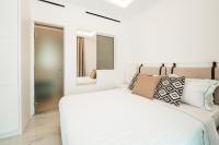 Posteľ alebo postele v izbe v ubytovaní Arcs Suites & Residences