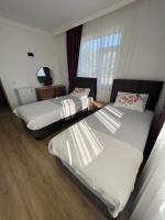 Postel nebo postele na pokoji v ubytování Asimado Hotel