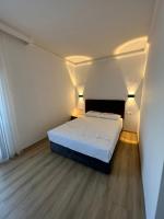 Postel nebo postele na pokoji v ubytování Asimado Hotel