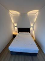 Postel nebo postele na pokoji v ubytování Asimado Hotel