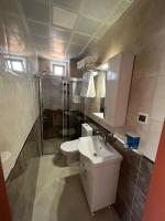 Koupelna v ubytování Asimado Hotel