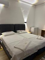 Postel nebo postele na pokoji v ubytování Asimado Hotel