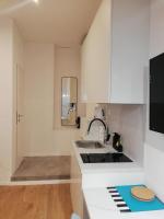 Kuchyňa alebo kuchynka v ubytovaní Apartments Simple Teslina