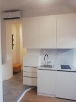 Kuchyňa alebo kuchynka v ubytovaní Apartments Simple Teslina