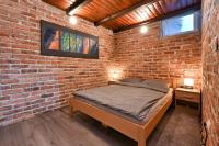 Posteľ alebo postele v izbe v ubytovaní Holiday House Dora - Nice home with nice forest view and Outdoor swimming pool, Whirlpool-Jacuzzi, Sauna, 2 bedrooms and WiFi