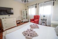 TV a/nebo společenská místnost v ubytování Villa Mirador Los Hoyos