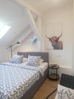 Posteľ alebo postele v izbe v ubytovaní Apartments Simple Teslina