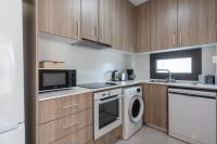 Kuchyň nebo kuchyňský kout v ubytování Flair 1-Bedroom Apartment in Larnaca