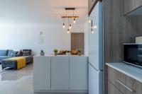 Kuchyň nebo kuchyňský kout v ubytování Flair 1-Bedroom Apartment in Larnaca