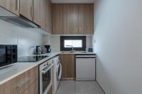 Kuchyň nebo kuchyňský kout v ubytování Flair 1-Bedroom Apartment in Larnaca