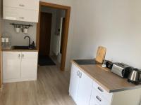 Kuchyňa alebo kuchynka v ubytovaní Apartament w Parku Planty