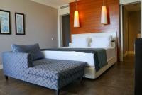 Postel nebo postele na pokoji v ubytování Sundance Suites Hotel