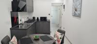 Kuchyň nebo kuchyňský kout v ubytování Apartman Julija 1