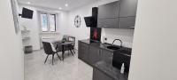 Kuchyň nebo kuchyňský kout v ubytování Apartman Julija 1